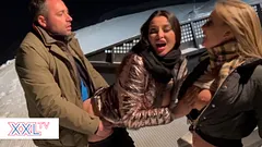 Nighttime ski slope threesome